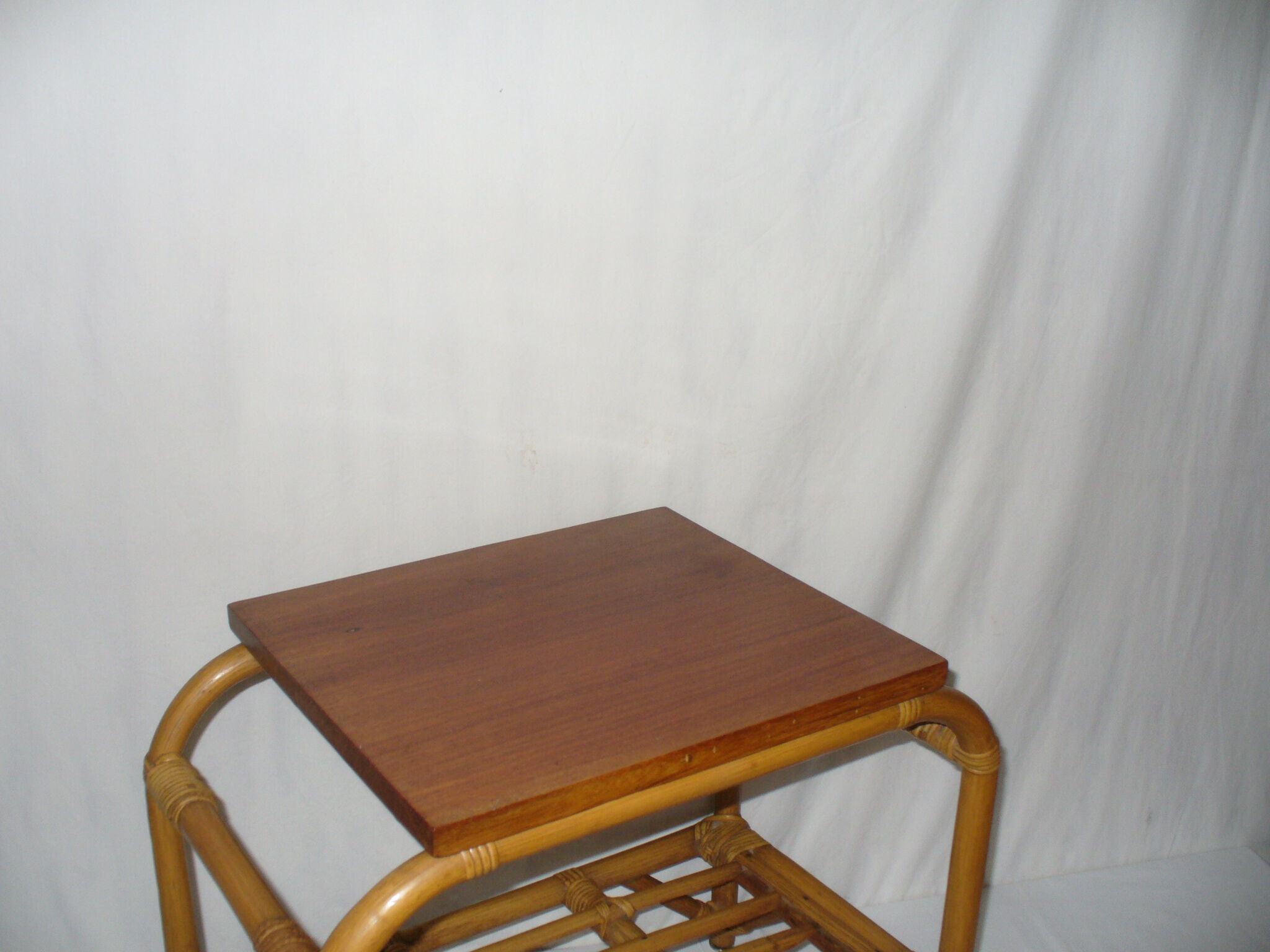 Rattan top bedside table from the 1950s