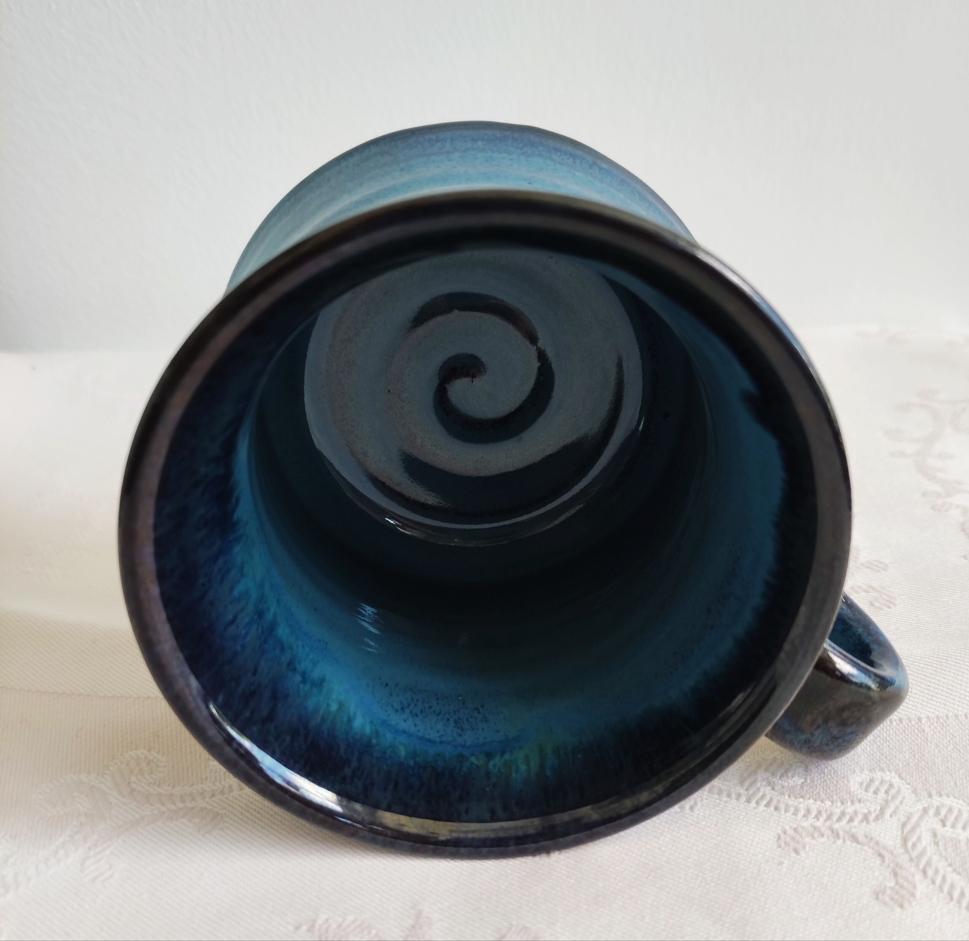 Blue enamelled terracotta mug