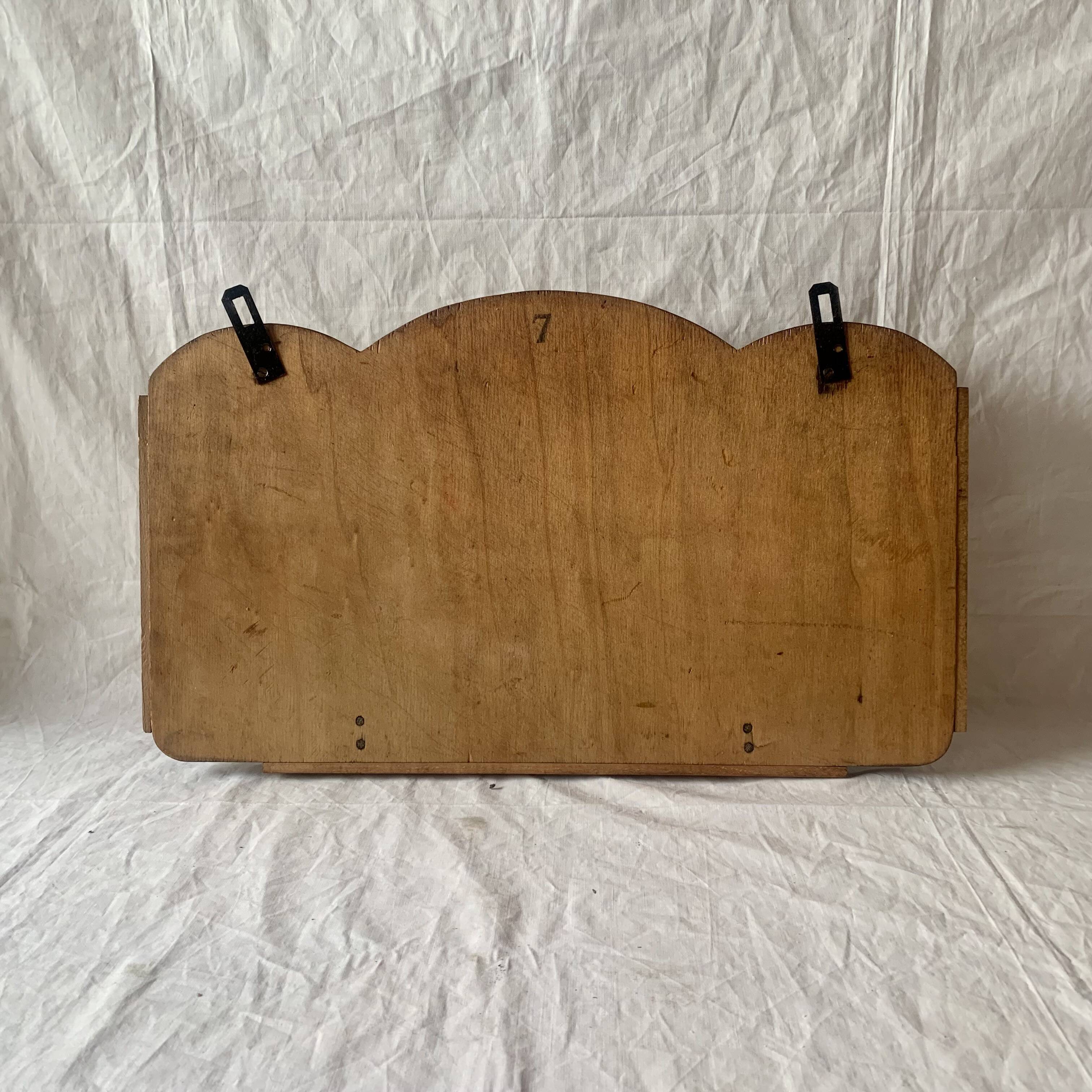 Art Deco wooden wall coat rack with round central mirror
