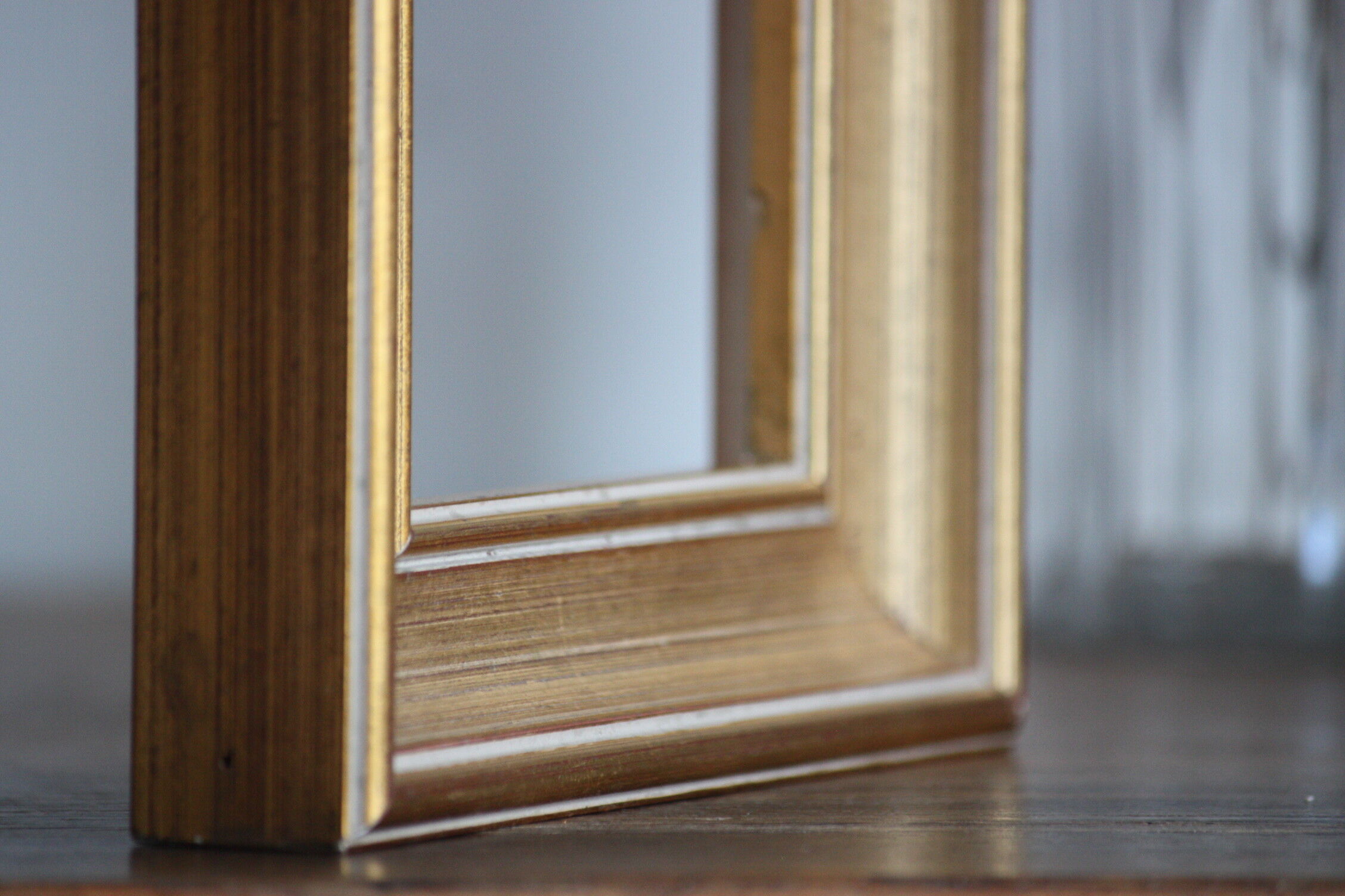 Moulded gilded wood frame