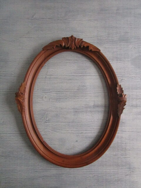 Old oval wooden frame