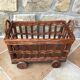 Small wicker wheeled cart
