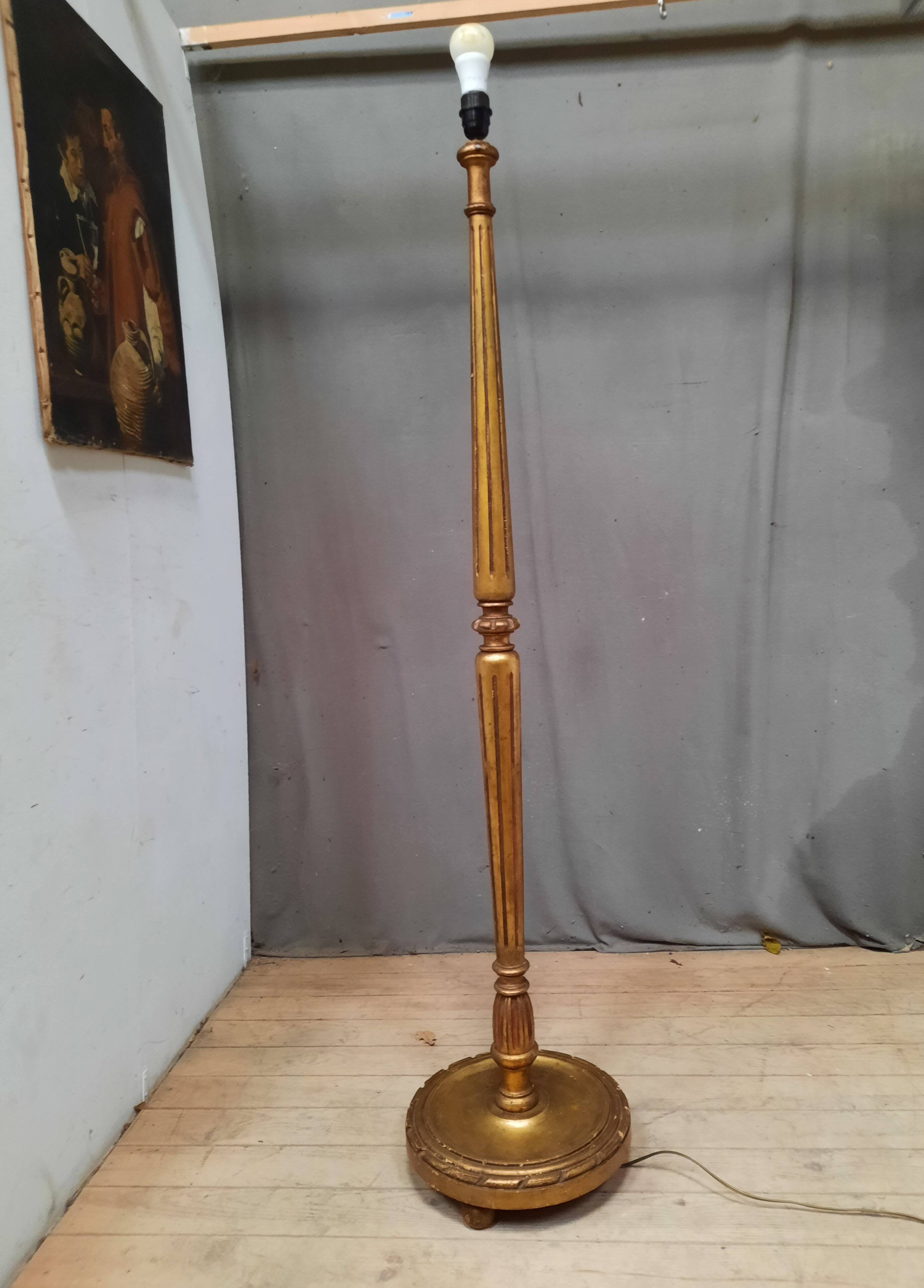 Golden wood floor lamp