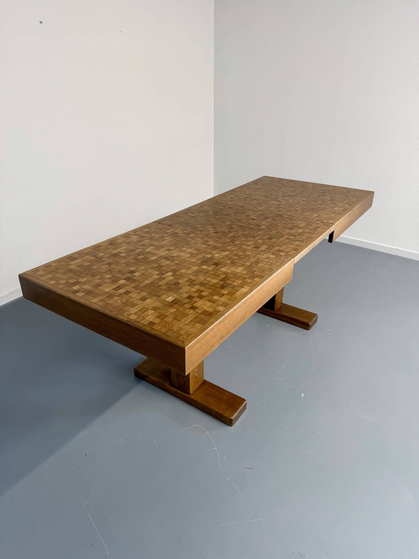 Wooden marquetry dining table designed by Dieter Waeckerlin from the 1960s.