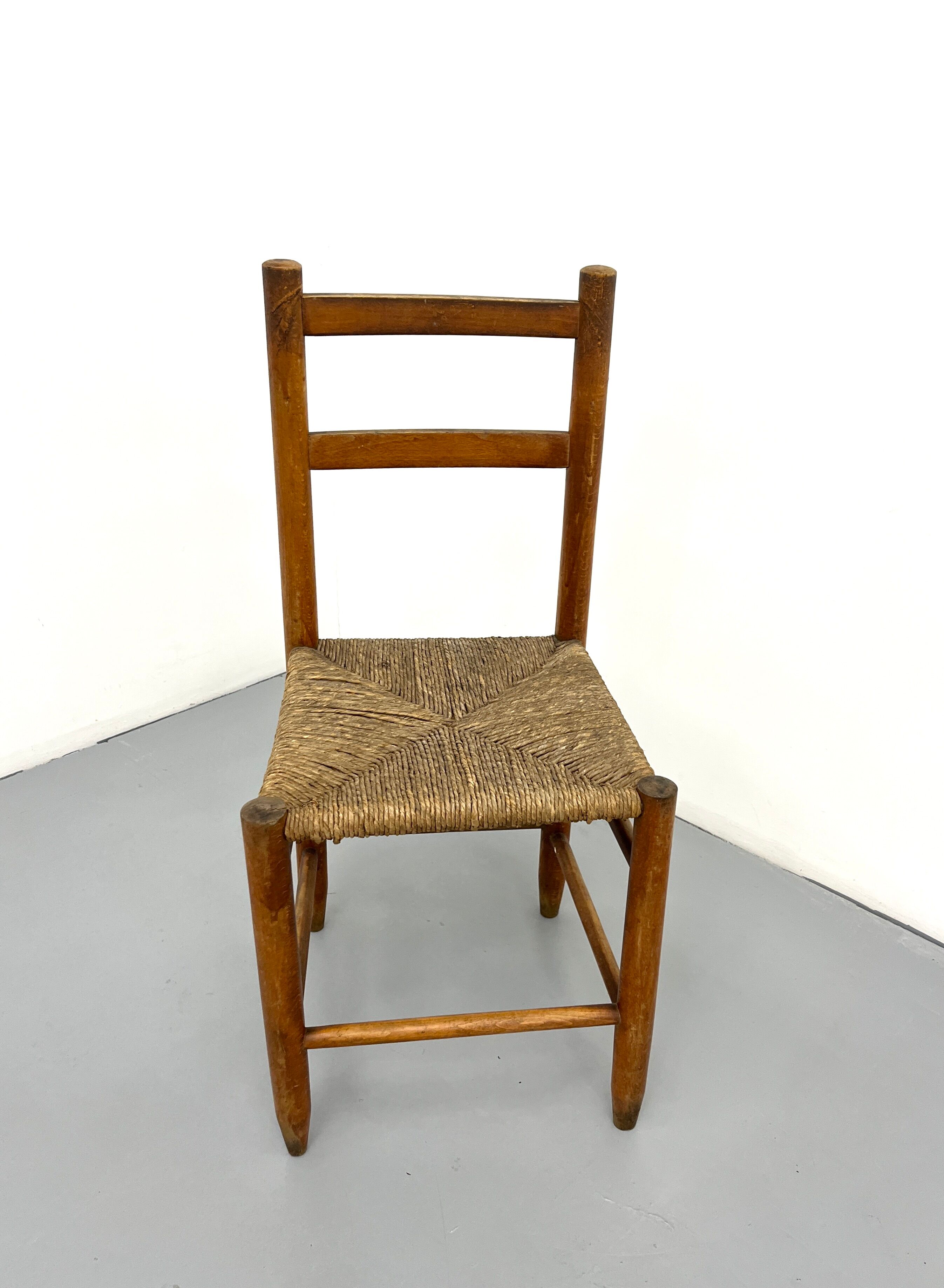 Pair of vintage wooden chairs with mulched seat