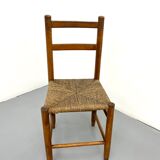 Pair of vintage wooden chairs with mulched seat