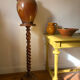 Antique pedestal table with a twisted column.