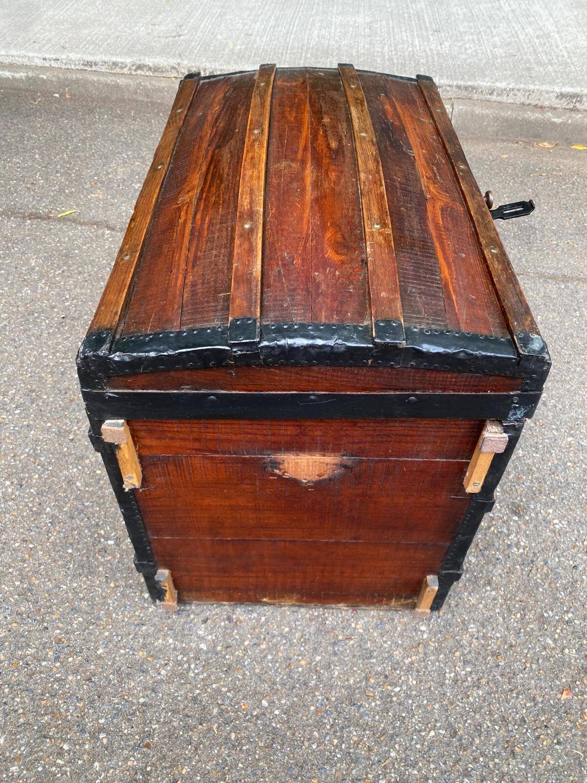 Vintage domed travel trunk from the 19th century.
