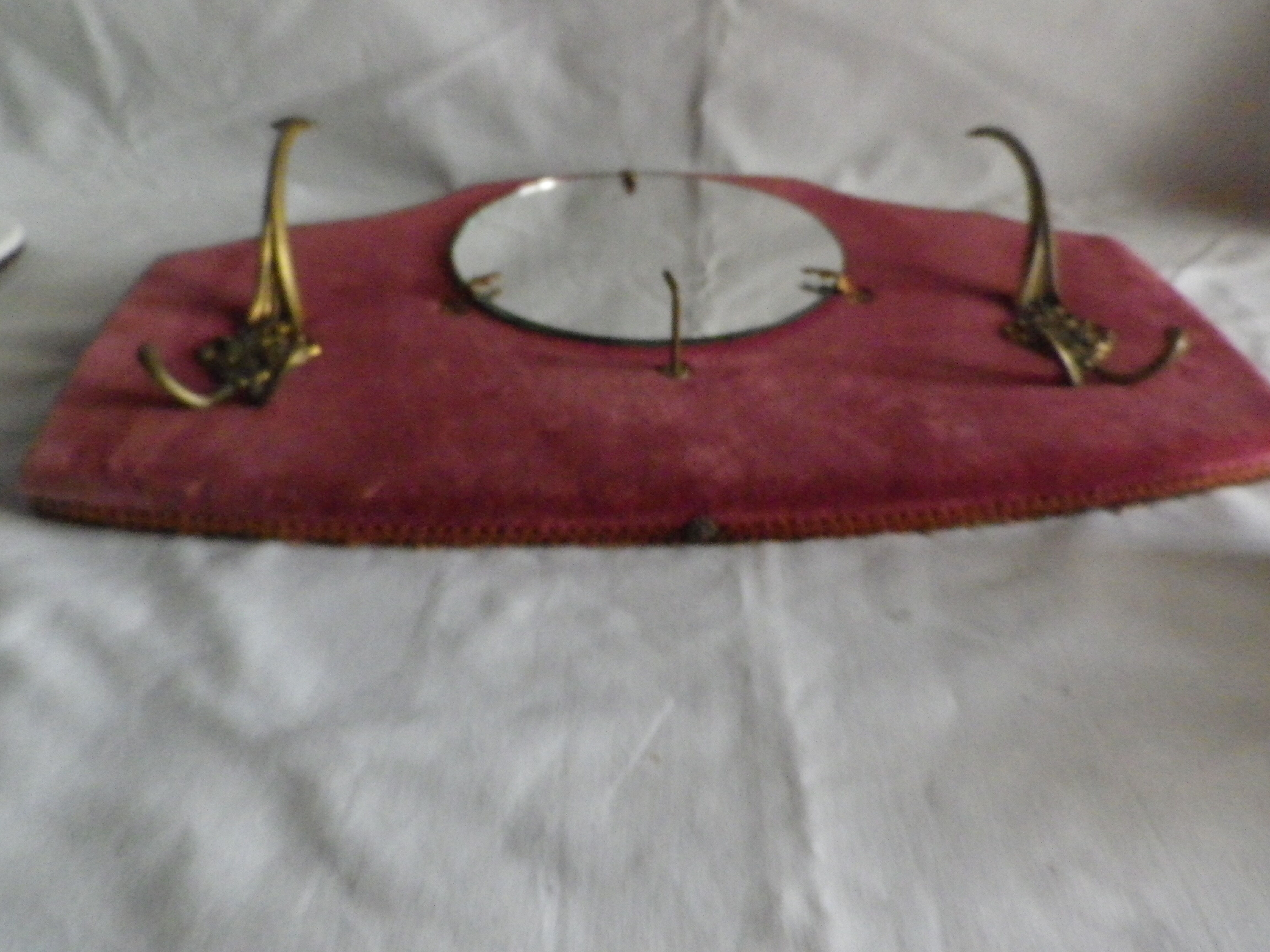 Mirror on red velvet