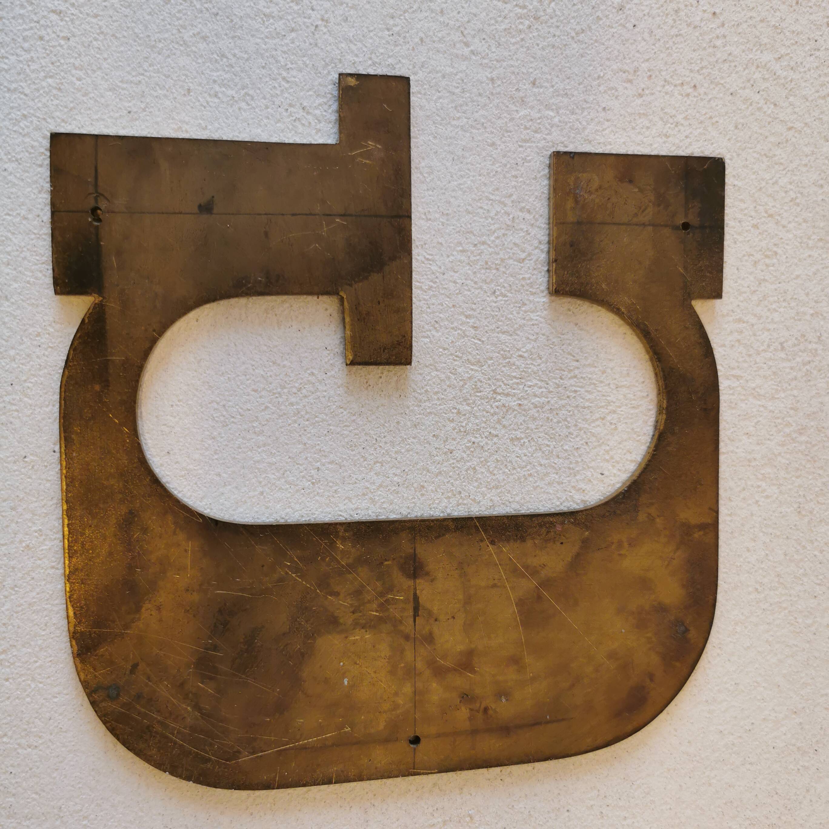 Letter "G" in brass