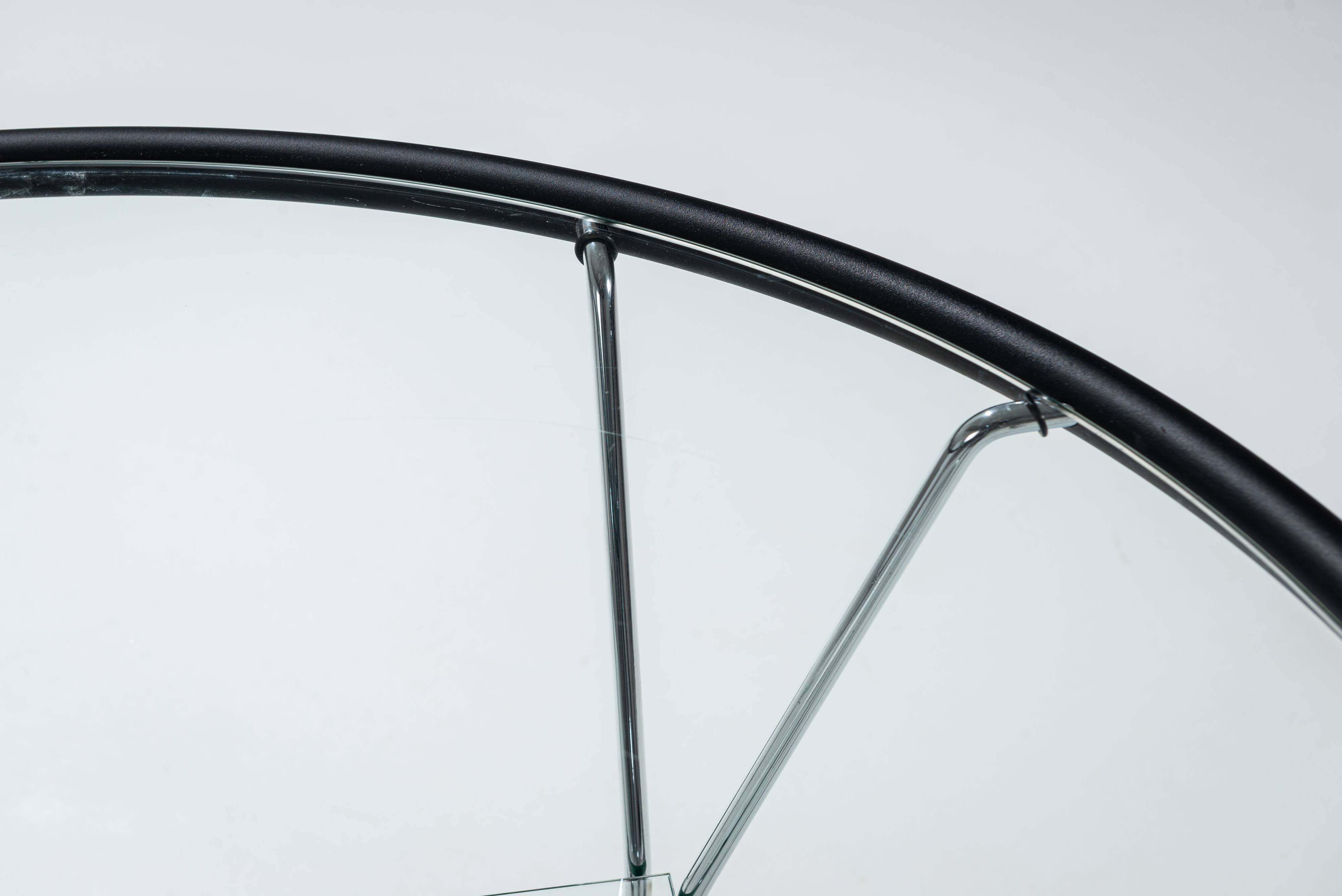 Post-Modern round glass and steel coffeetable attributed to Niels Bendtsen