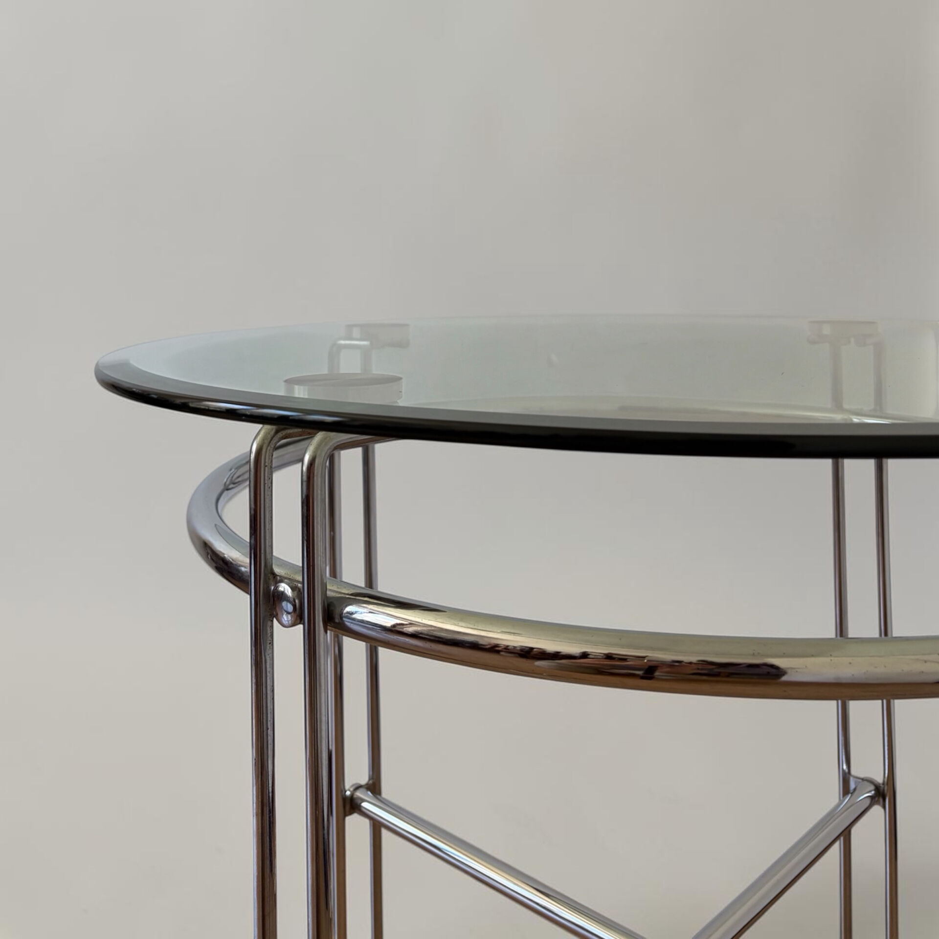 Chrome metal and glass tubular table