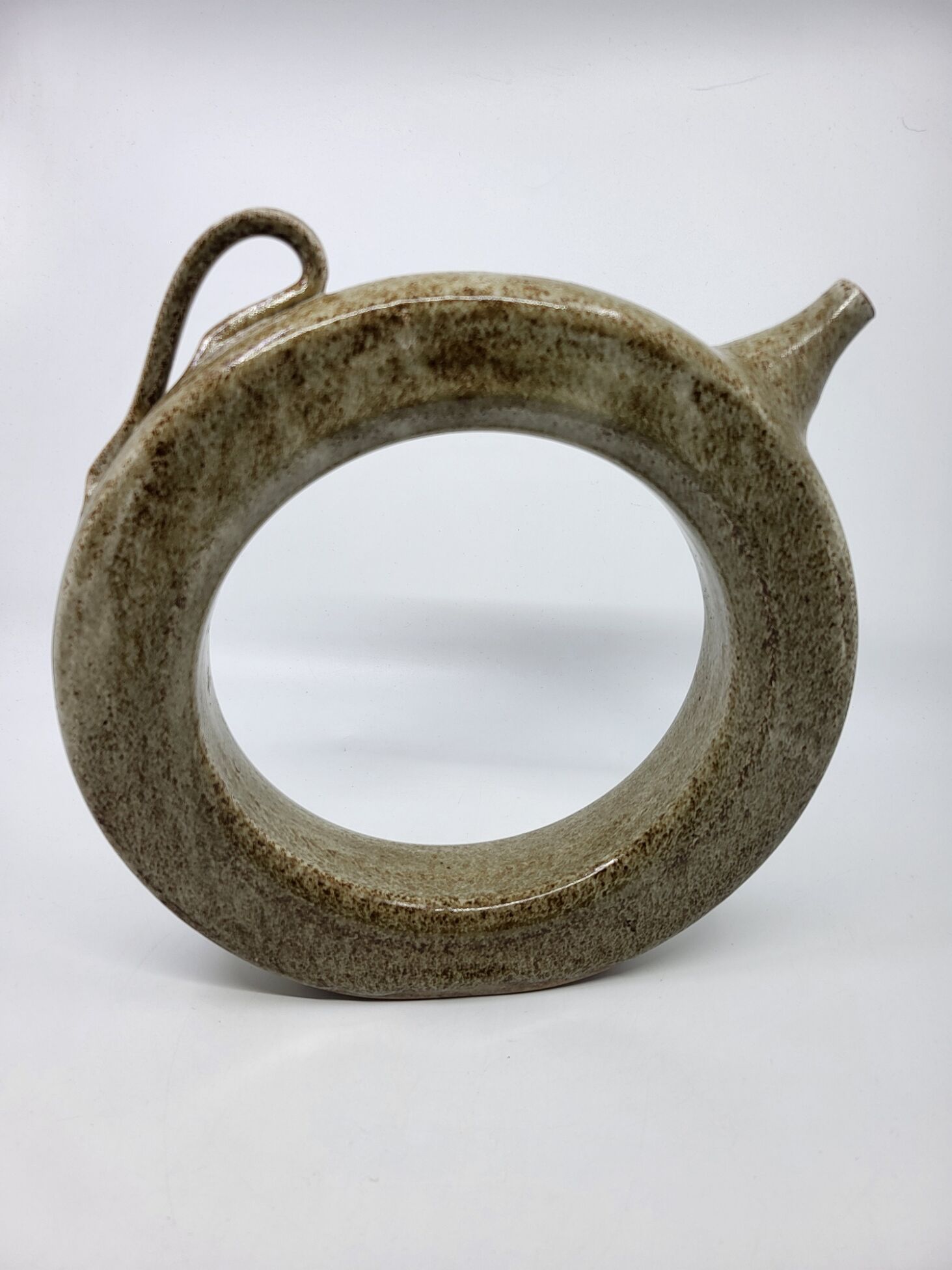 Vintage glazed stoneware pitcher in sculptural ring shape (1970s)