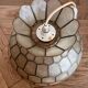 Mother-of-pearl suspension
