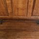 Antique English oak hall bench from the early 19th century with storage space