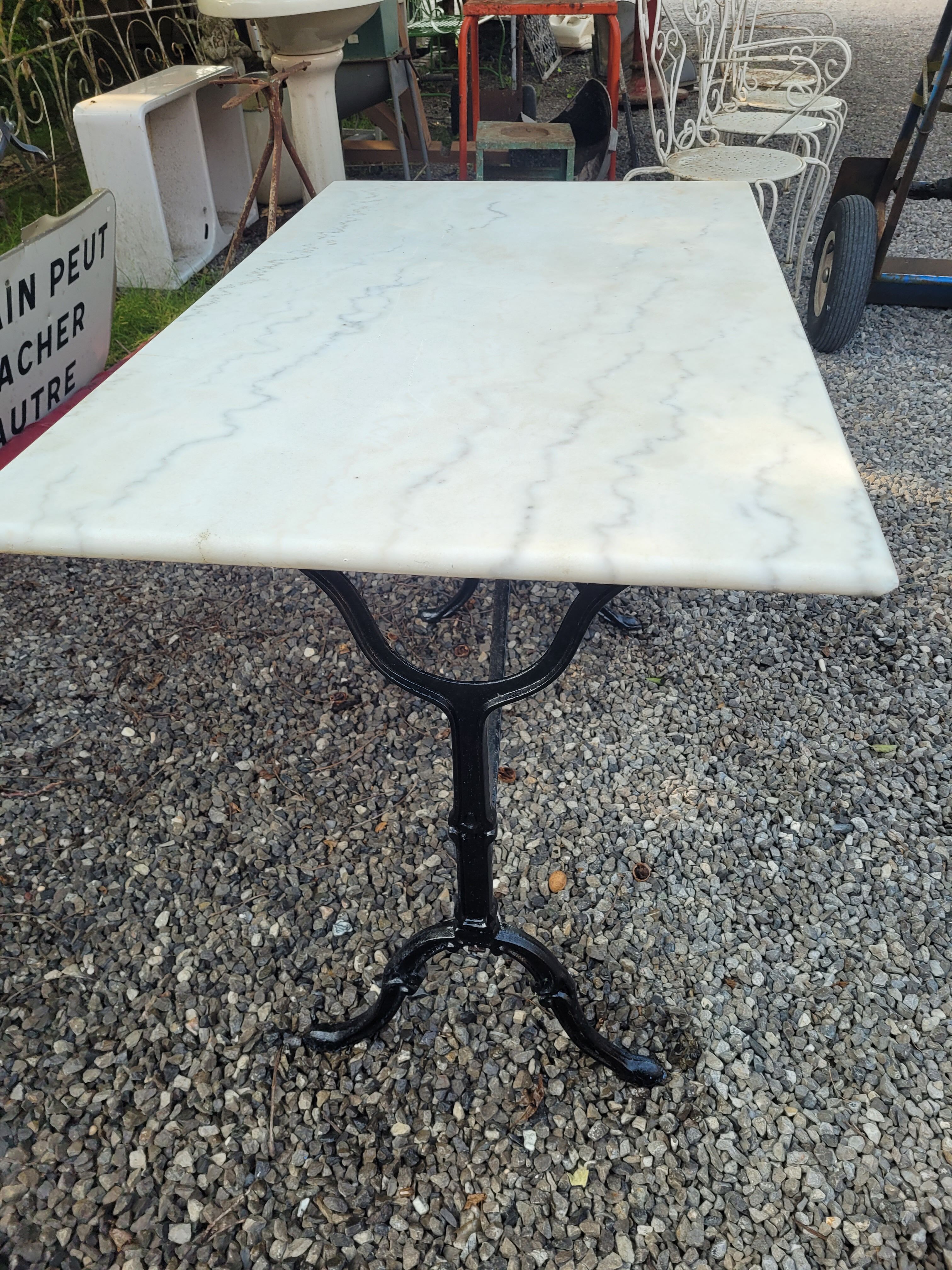 Bistro table top marble foot cast iron