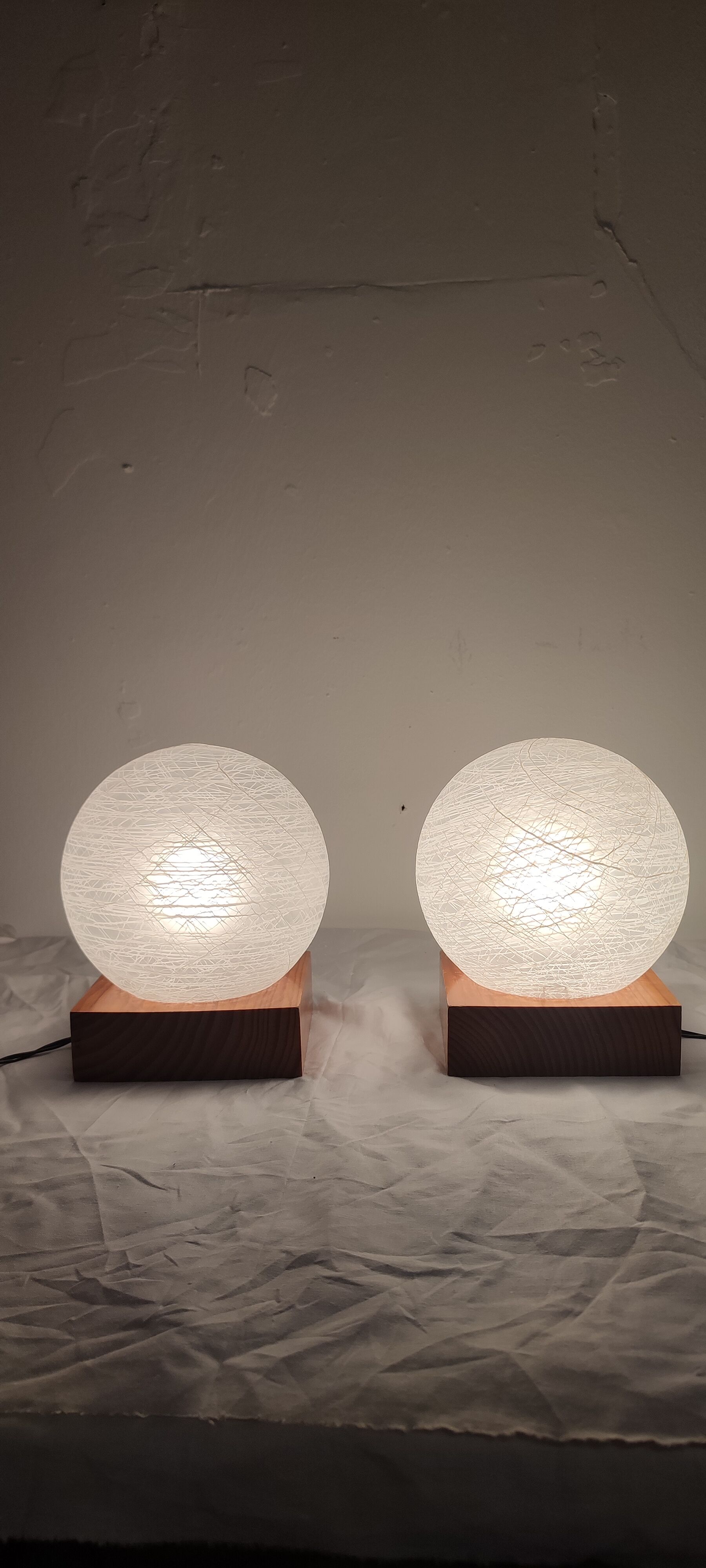 Pair of wooden and glass table lamps. Italy, 1970s.