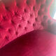 Small old Napoleon III toad sofa in red velvet