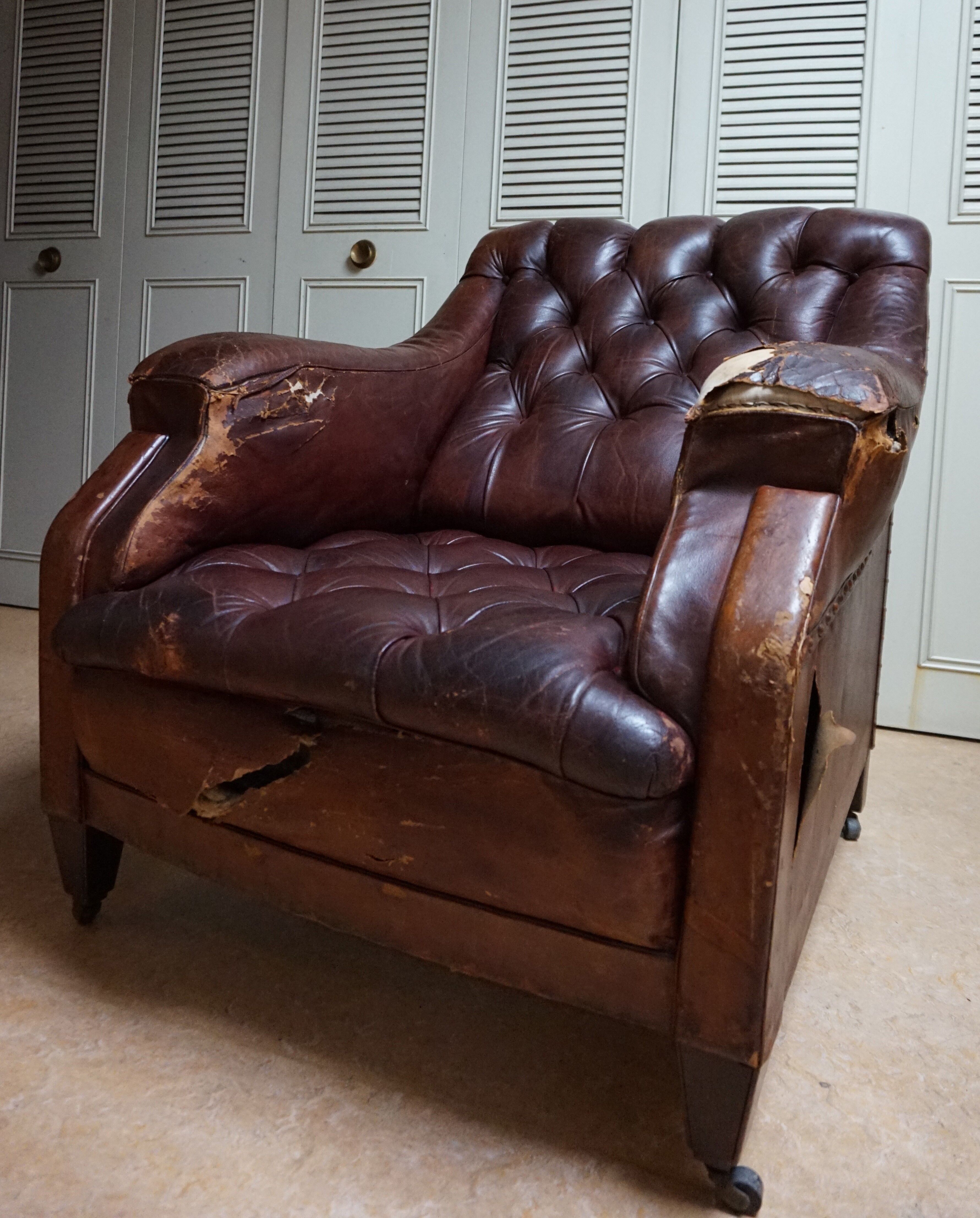 Worn Leather Buttoned Library Fireside Armchair, 1840's