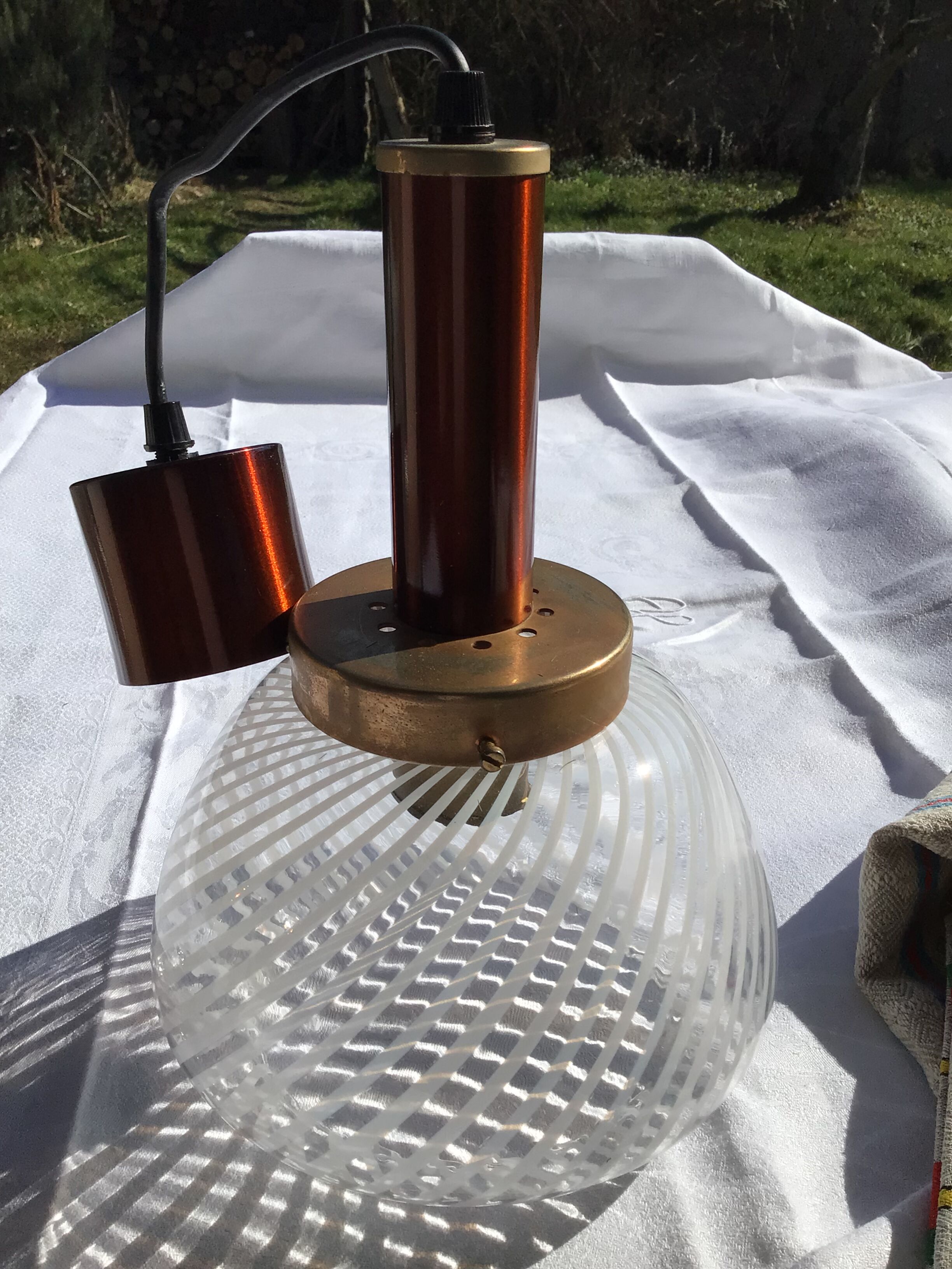 Copper suspension with white striped blown glass