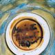 French hand-painted art pottery charger dish by Marjatta Taburet, Quimper, 1960s.