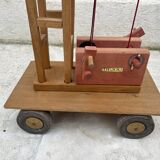 Vintage wooden crane toy from the 60s