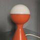 Egon Hillebrand Space Age table lamp, orange base, white shade, 1960s