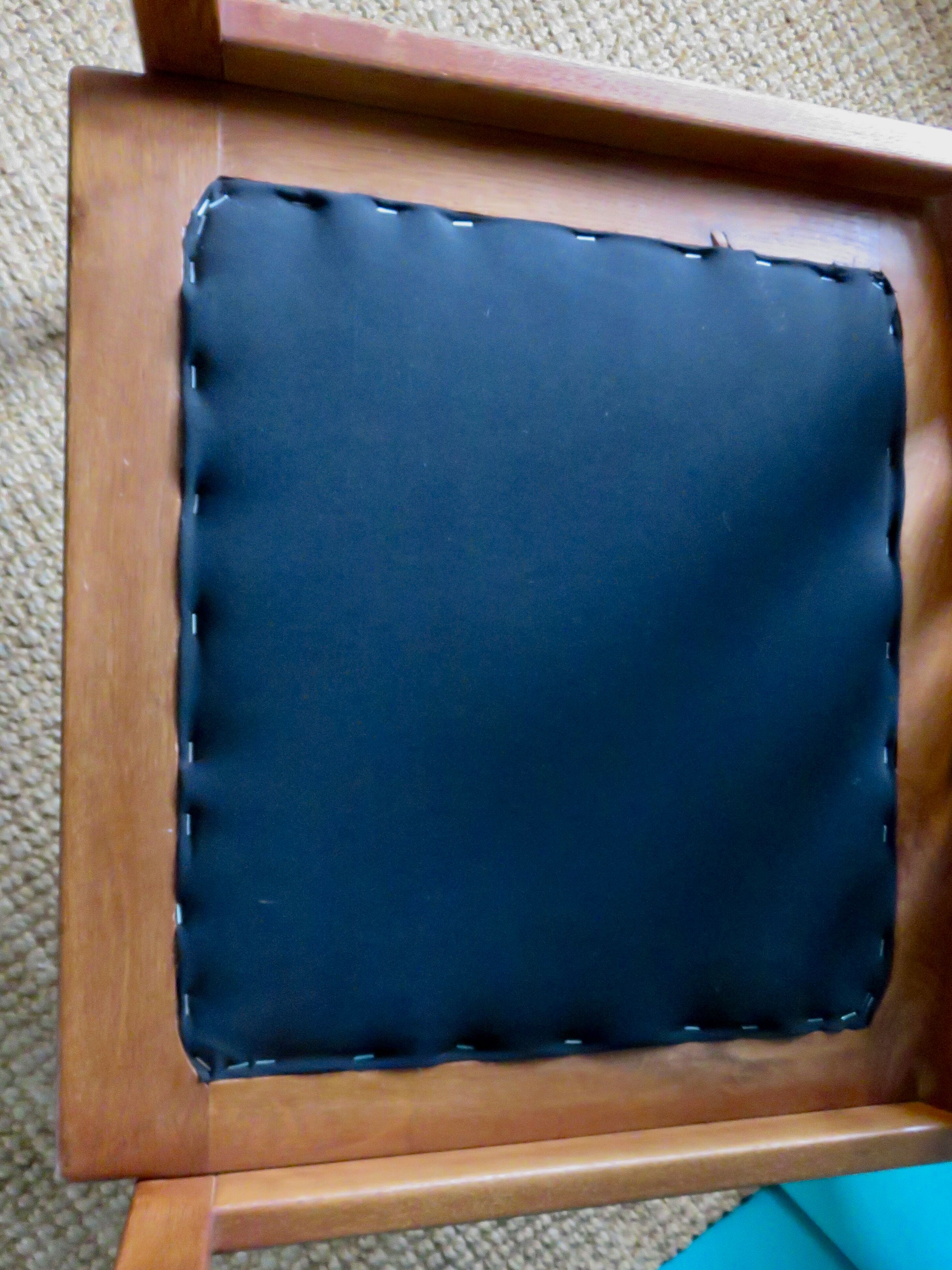 Pair of oak faults with tawny leather cushion. Denmark 1960