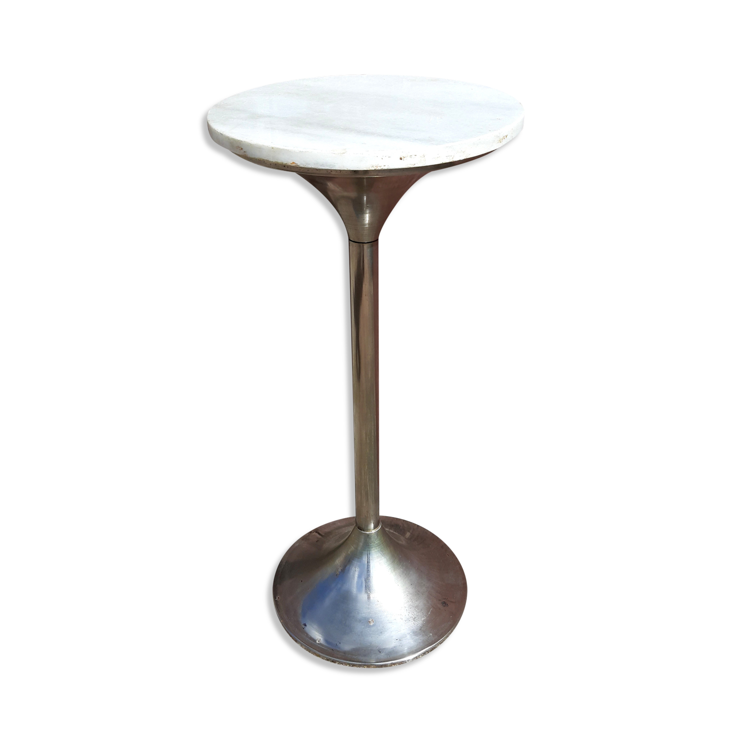 Golden metal selette on marble