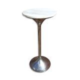 Golden metal selette on marble