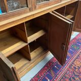 Meuble vitrine de magasin ancien en chêne