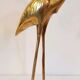 Pair of herons in brass