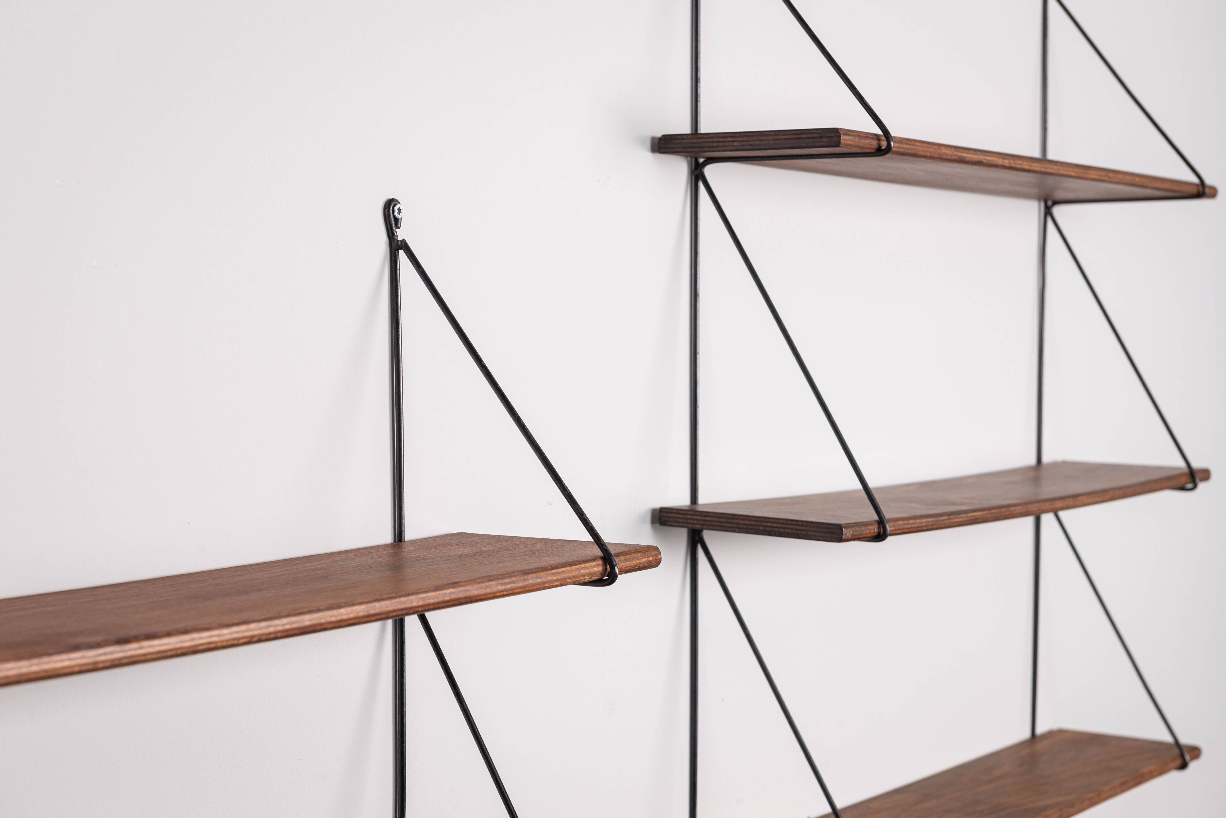 Set of minimalistic wooden shelving units