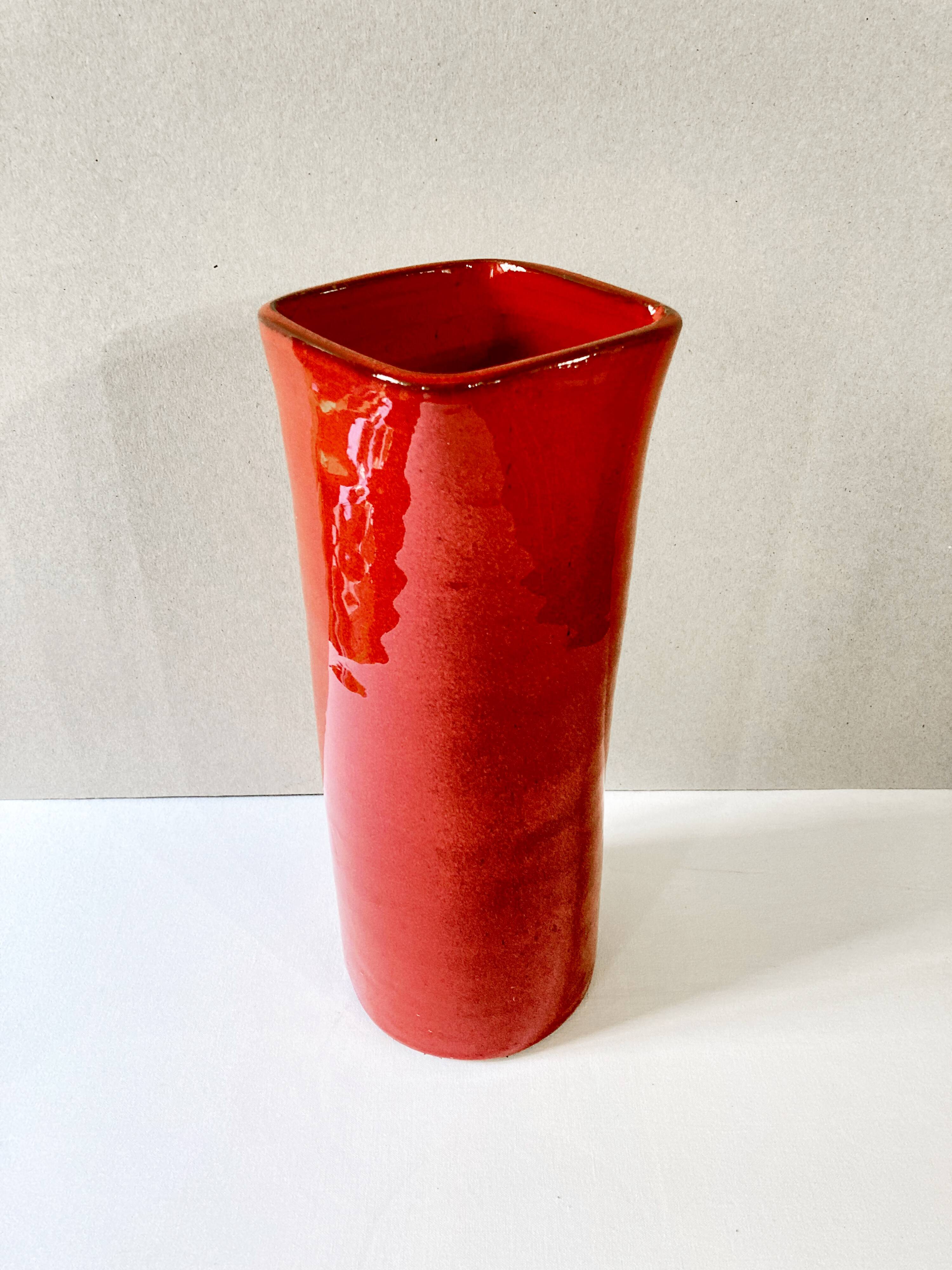 Large red glazed ceramic vase