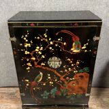 Chinese cabinet in black lacquer and colored decorations