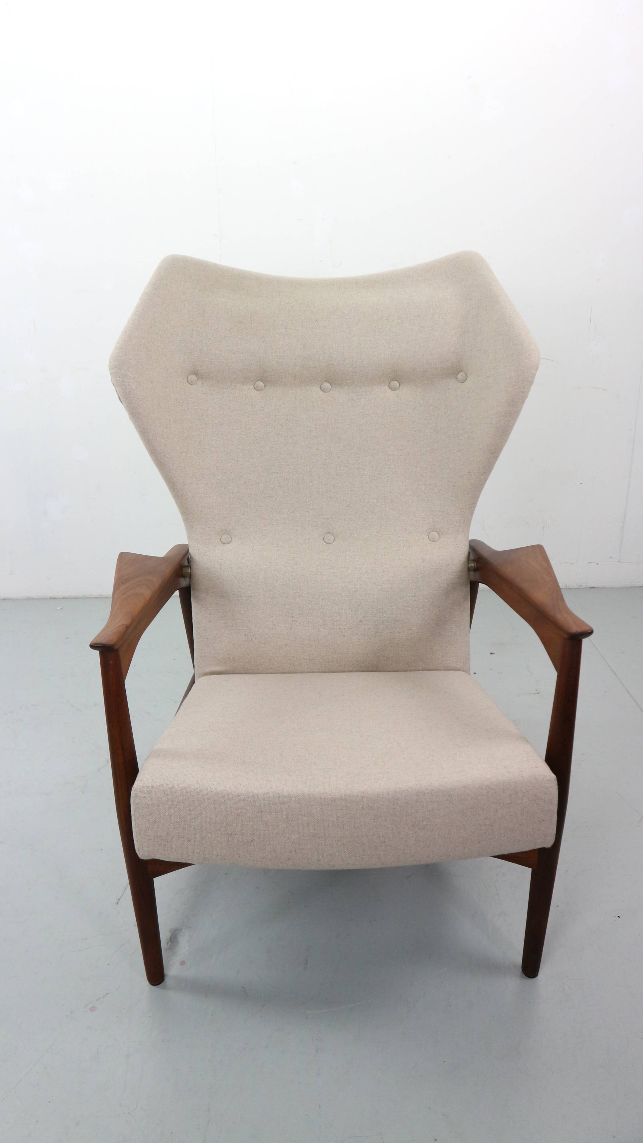 Danish adjustable wingback lounge chair in teak by Ib Kofod Larsen