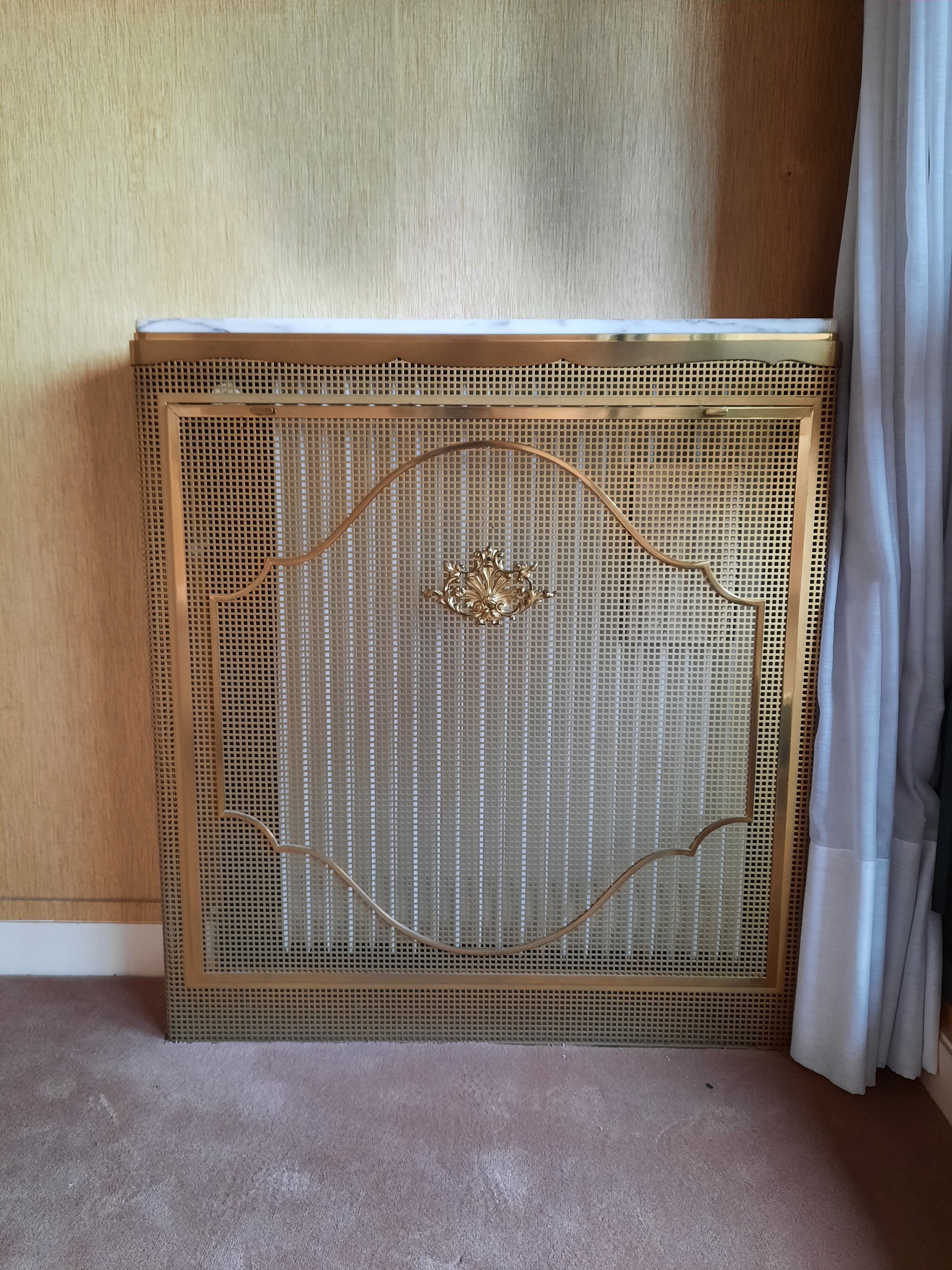 Marble and brass radiator cover