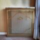 Marble and brass radiator cover