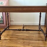 Table with a spacer topped with a spinning top.