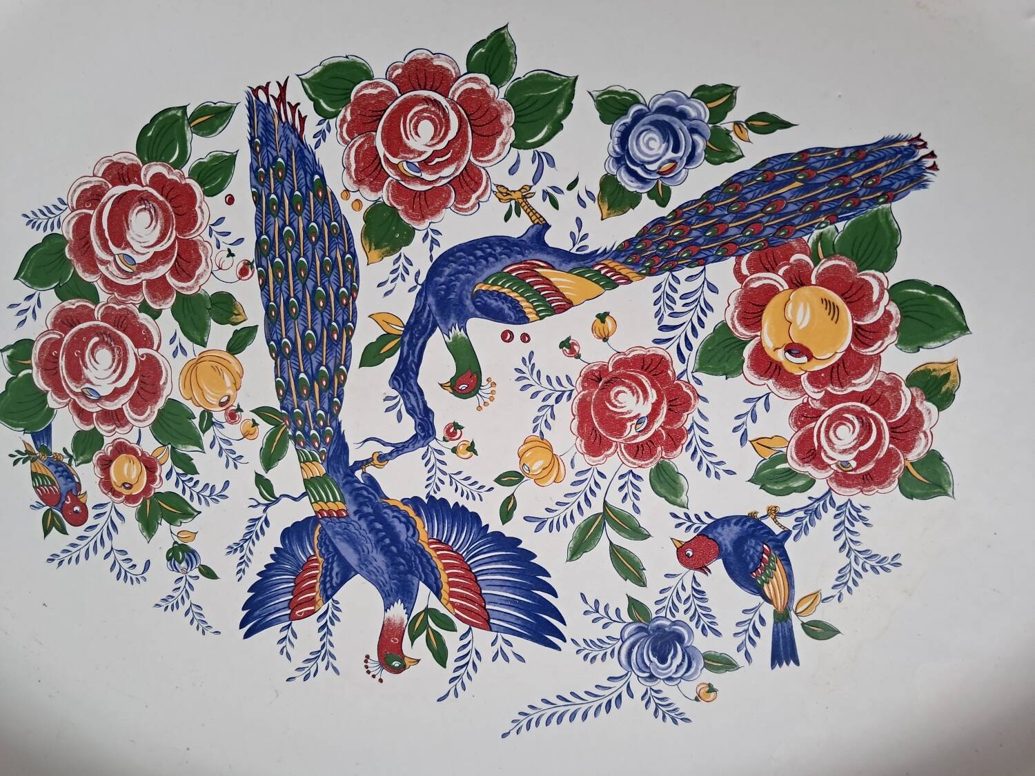 Large oval white ceramic platter, decorated with peacocks and vintage flowers