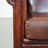 English style sheepskin leather wingback chair in a cognac color