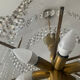 Vintage lucite chandelier with a cascade of crystal pendants from the 1970s.