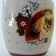 Far Eastern porcelain sake service consisting of a carafon and six cups