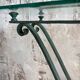 Glass and metal console with antique patina