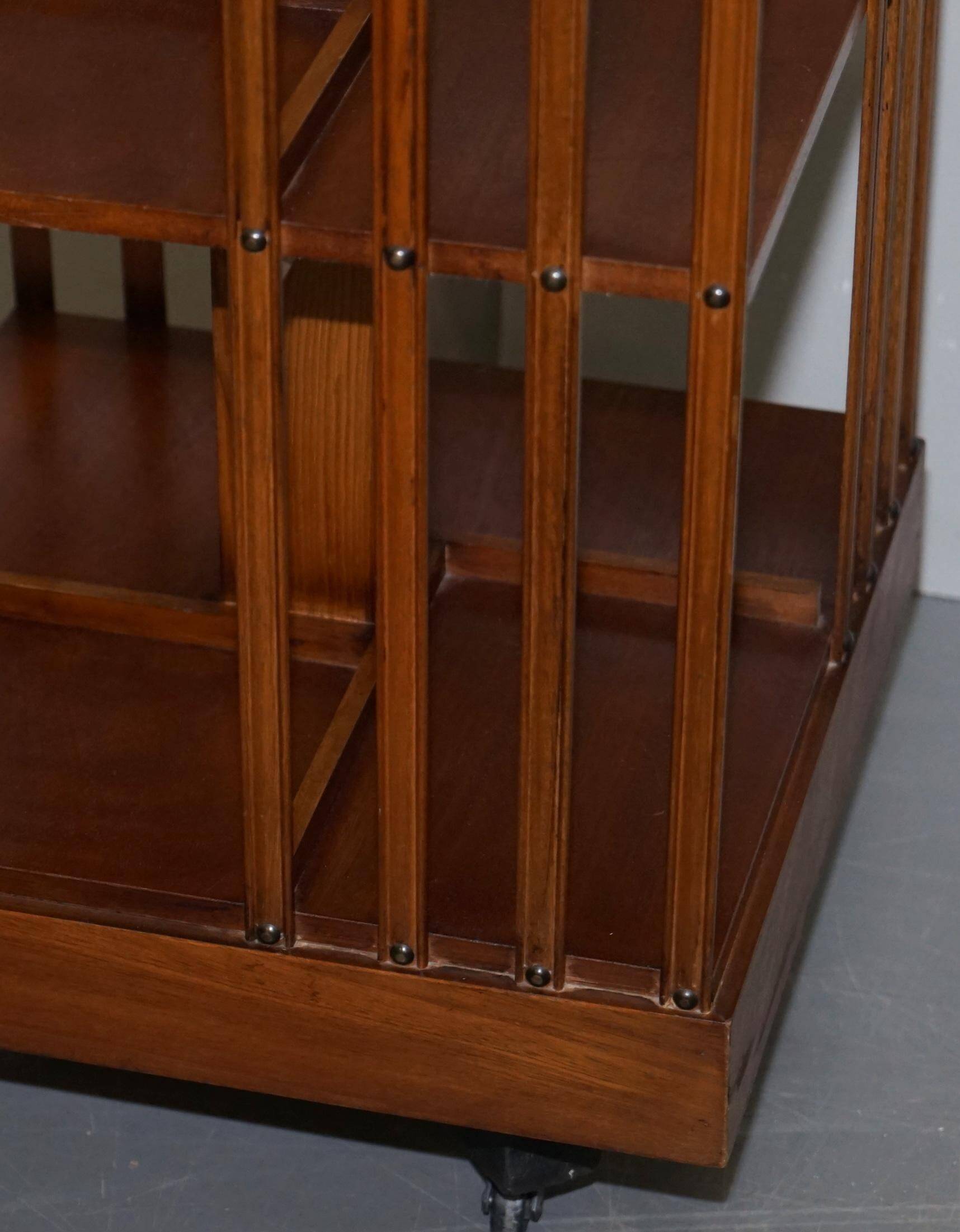 Edwardian revolving library in burl walnut with Sheraton inlay circa 1900