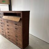 Large wooden workshop cabinet with 16 drawers, antique from the early 1900s.