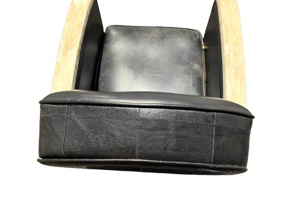 Pair of leather armchairs with marquetry armrests
