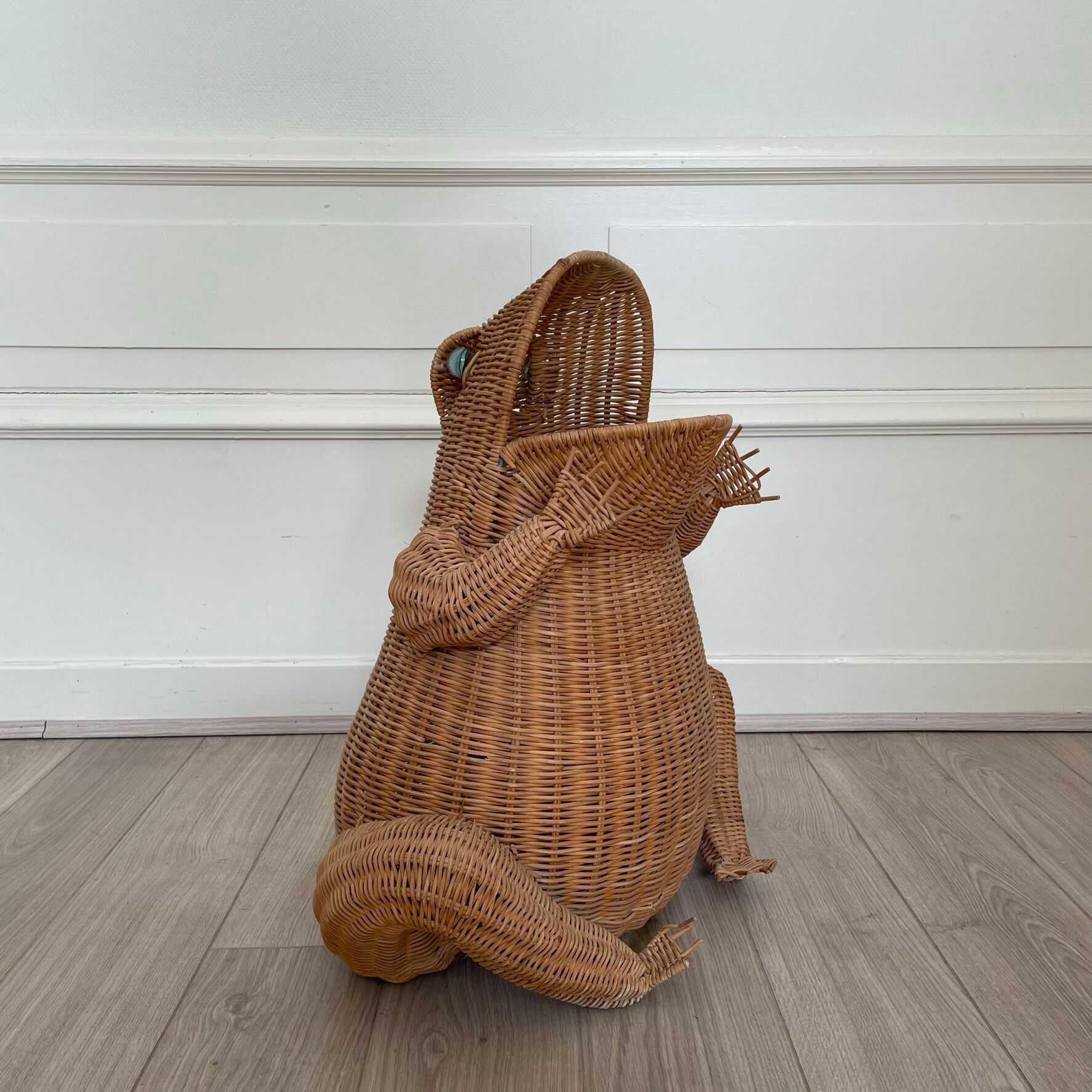 Wicker frog magazine holder by Olivier Cajan