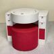 Bathroom toilet with a 70s pouf.