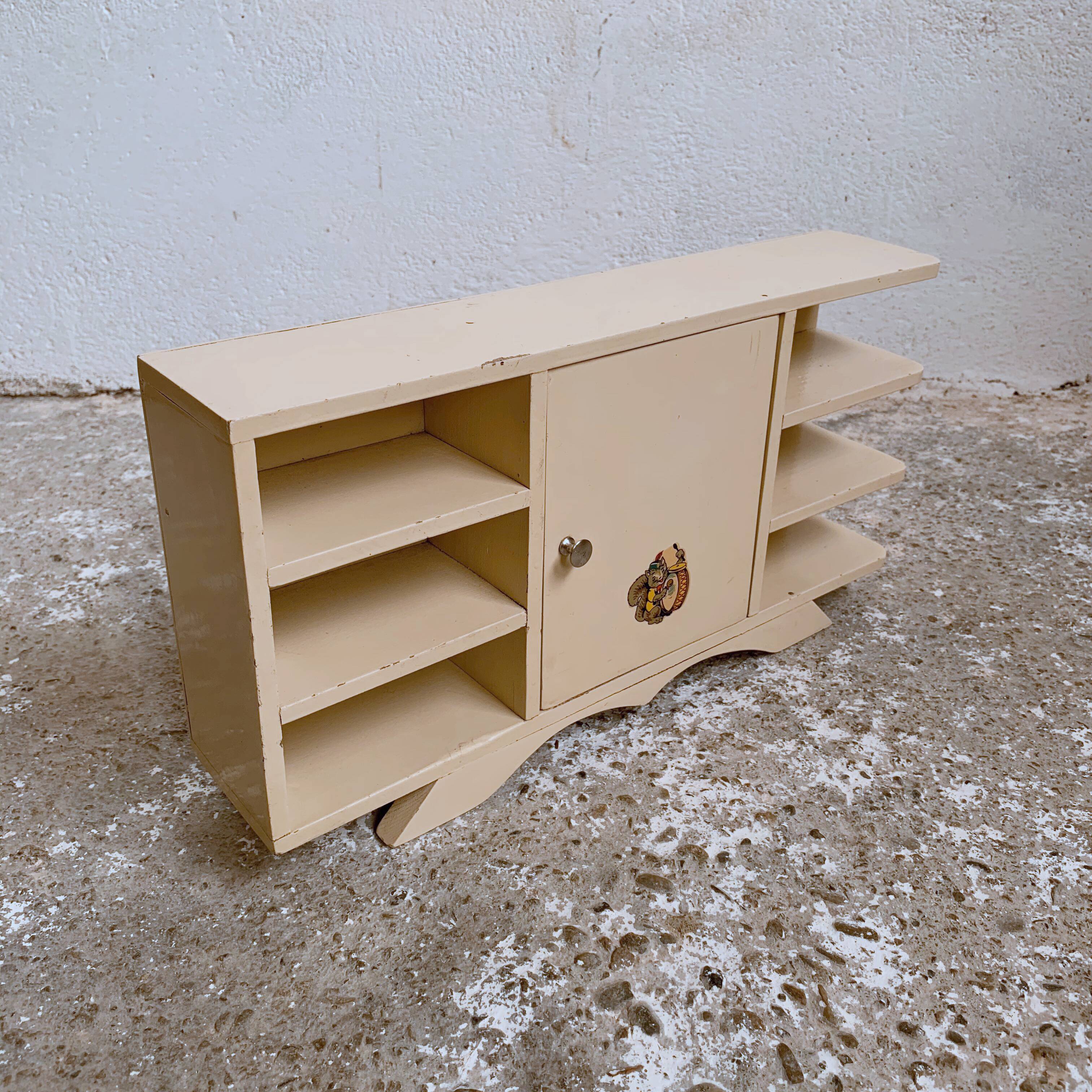 Old doll row wardrobe